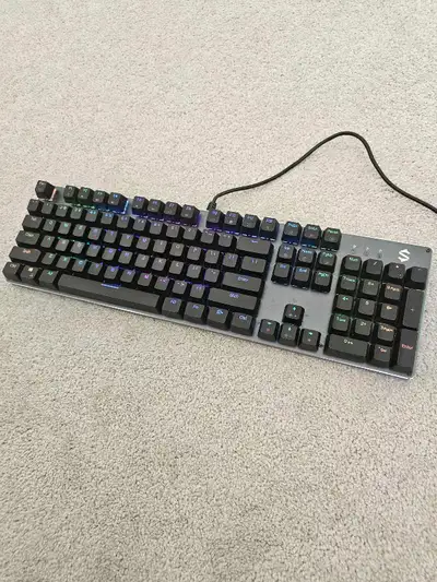 Blue switch, click keyboard, black shark. Has many customizations features. If you want to hear the...