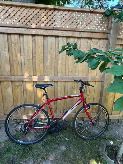 Selling a Rocky Mountain Red Hybrid bicycle in red and white. It's in excellent condition and ready...