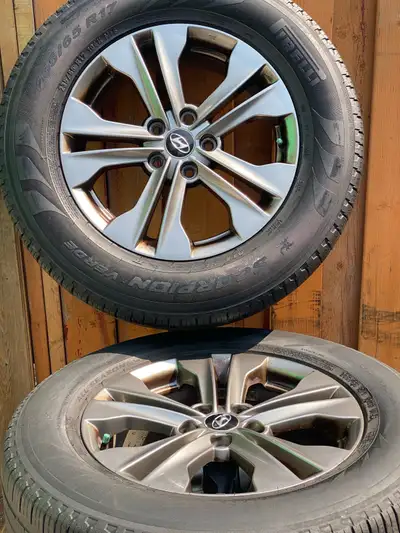 235/65R17 Hyundai Tucson Pirelli all season tires with Hyundai original rims ￼ ￼ Pick up middland an...