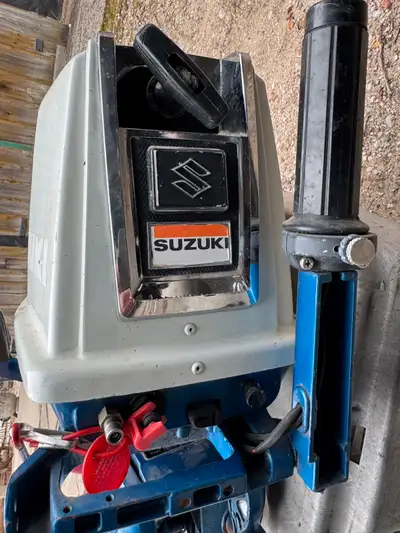 Suzuki 7.5hp long shaft 2 stroke, ran last year. It’ll be fired up soon this year. It includes gas t...