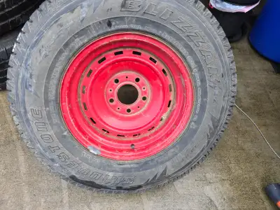 4 GMC Rallye Wheels with Blizzak winter tires, the tires are out of date but have been stored out of...