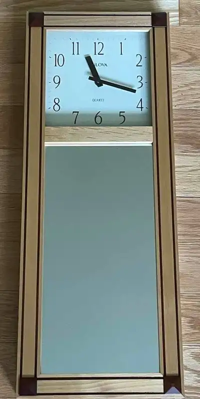 Bulova Hanging Wall Clock with Mirror Accent – Model C4233, View more