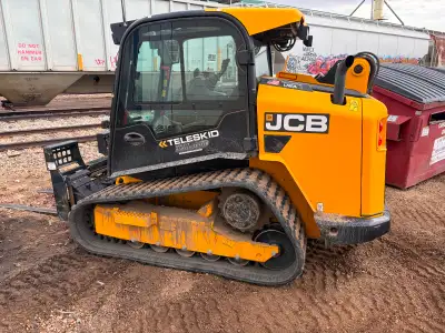 2017 Track loader with telescopic boom, 2spd, ac, htr, stereo, aux. hyd., smooth bucket. Forks not i...