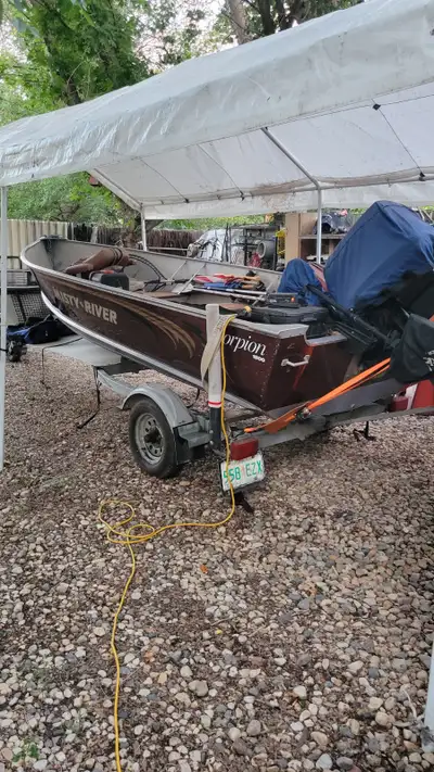 Ready to go for your fishing enjoyment! Misty River boat and trailer Newer Tires on trailer Tarp inc...