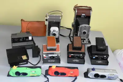 Lot of 9 Polaroid Collection of Camera's, SX-70 etc., View more
