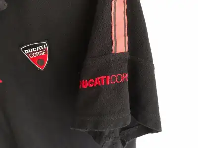 Very nice black Ducati polo shirt. paid 50$ US...( i have the receipt) sell for 60 negociable, of 50...