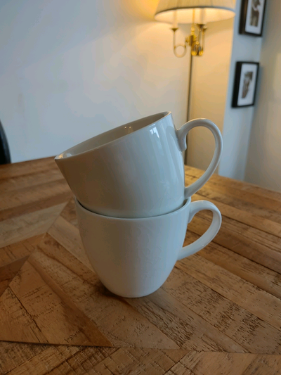 Pair of white tea cups , View more