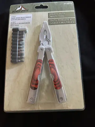 This is Power State Heavy Duty Multi Tool, 23 in 1 Pakka Wood inlay Handle with nylon sheath. Condit...
