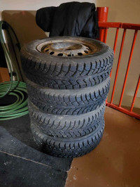 4x winter tires with lots of threading (barely used) 185/70 R14 