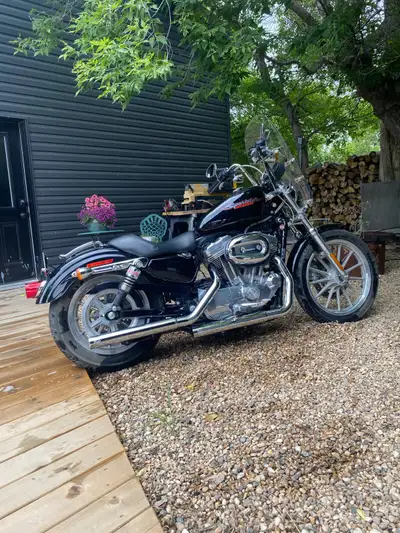 This bike has a lot of extras, including, Vance and Hines slip on exhaust, braided brake lines, cust...