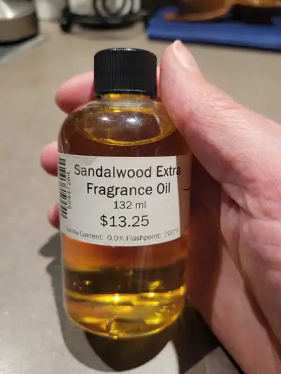 Sandalwood fragrance oil. Only used once and hubby did not like it! Pick up only.