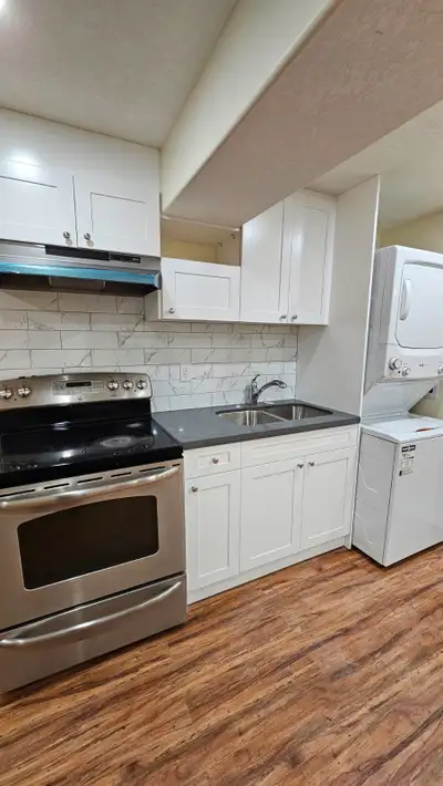 A walkout basement located near a bus stop, Sunrise shopping Center, schools, medical clinics, denta...