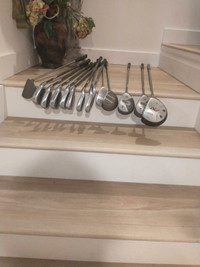 Complete set of golf clubs , graphite shafts, bag, balls tees Rh