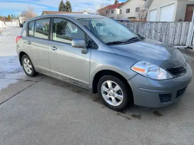 SELLING MY 2012 NISSAN VERSA SL HATCHBACK POWER WINDOWS POWER LOCKS KEYLESS ENTRY AM/FM/CD NEW TIRES...