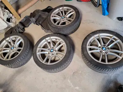 Selling a set of used winter tires mounted on rims, specifically designed for an F80 BMW M3. These C...