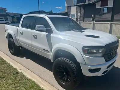 2022 Ram 1500 sport lifted. Tri-White metallic Truck has Night pkg, GT pkg, skyroof, power running b...