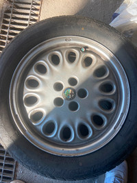 4 set de pneu sur jante de marque Dunlop