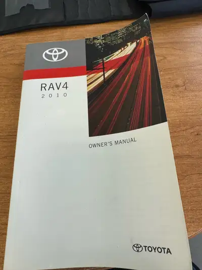 Selling the 2010 Toyota RAV4 Owner's Manual, which includes essential information about vehicle feat...