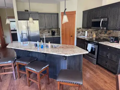 4 bedroom 3 bathroom half duplex available May 1 through October 31 2026. Furnished, utilities inclu...