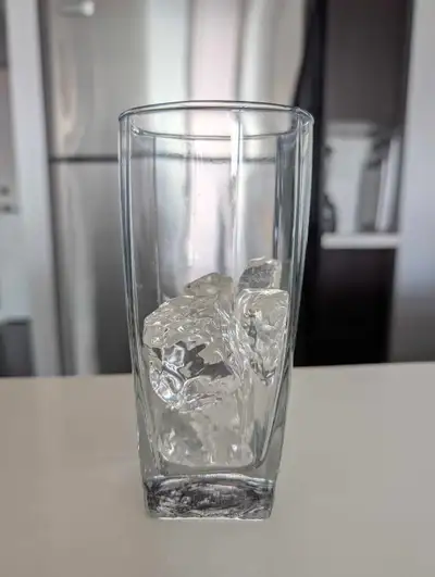 6 ice cubes of different shapes and sizes.