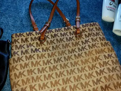 Coach and MK w, View more