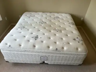 Sealy king size mattress. Comes with boxspring and metal frame. Used, decent condition. Minor stains