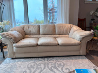 Leather Chesterfield loveseat and fabric swivel chair/footstool