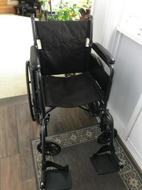 Wheel chair folds and you can remove foot rests