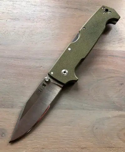For sale is a SR1 Cold Steel in S35VN. I removed the texturing off the G10 below the clip, so the kn...