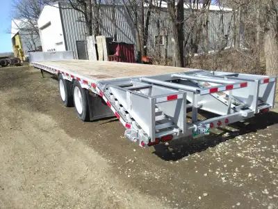 53’ step deck with ramps, aluminum/steel combo, aluminum rims, excellent tires, wood deck, LED light...