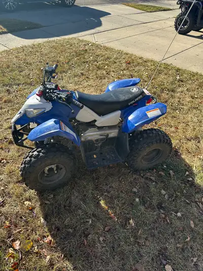 Great Starter ATV for Kids Well-maintained 2012 Polaris Outlaw 50, perfect for young riders learning...