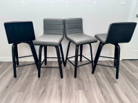 LIKE NEW - 4 COUNTER HEIGHT SWIVEL CHAIRS