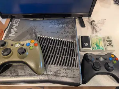 Xbox 360 Modern warfare edition MOD. Yes it is available. The price is firm. Two controllers, 2 rech...