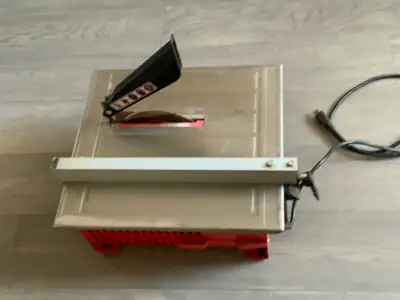 Tile saw with blade, View more