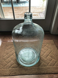 A few Carboys for sale along with a plastic 18l water refill jug