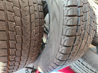 4 Yokohama winter tires on black Fast 10 spoke alloy mags.  Used