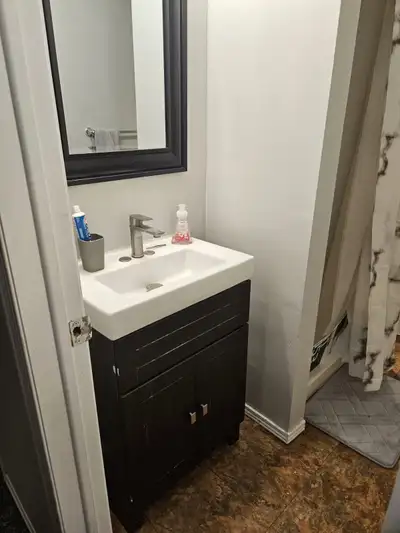 Basement private furnished room is available for rent in a clean, quiet home shared with two other f...