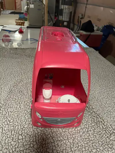 Camper. Some Missing pieces (ie slide and back panel ). Priced accordingly.