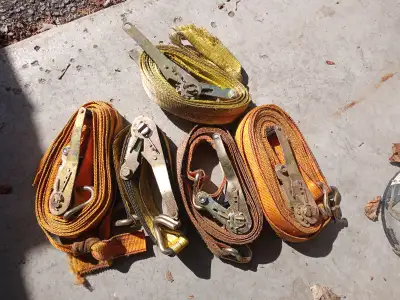 Heavy duty shipping straps. 5 all together, 3 in good shape, 1 in fair shape, 1 is broken with the s...