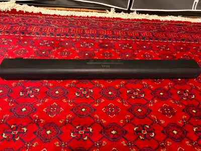 VMAI soundbar with built-in subwoofer. All cords included plus instruction manual and remote. You ca...