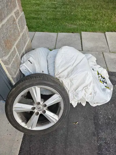 Four good condition Toyo Extensa HP2s all season tires on rims. Likely enough tread for at least one...