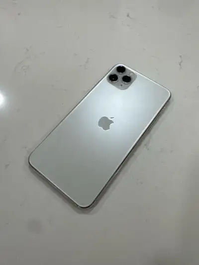 Excellent condition iPhone 11 Pro Max, white, with 256 GB memory. Comes with a case and a screen pro...
