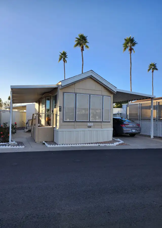 PARK MODEL W 2 PAVED PARKING AND PATIO AREAS