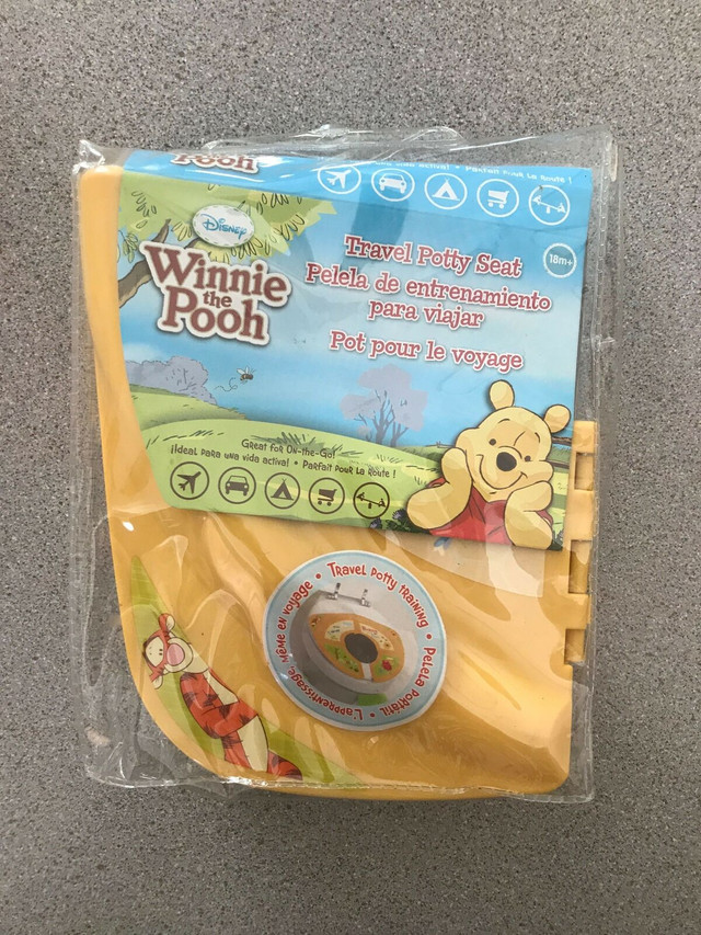 New Disney ‘Winnie Pooh’ Foldable Travel Potty Seat (Training) in Strollers, Carriers & Car Seats in Bedford