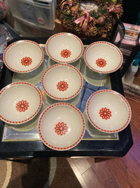Brand New Set of  Seven Porcelain bowls and plates 