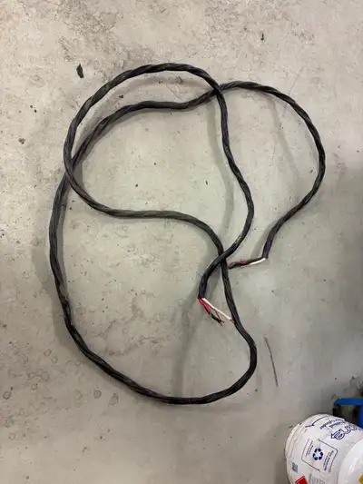 Heavy gauge (AWG 4 or lower gauge) wire. Three plus ground. 18 feet long. Used once to power heaters...