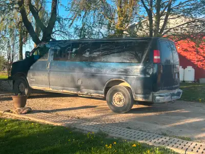 3500 Chevy Express 12 passenger van. Has full length body. Summer and winter tires are included. Ver...