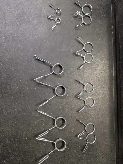 Selling a bunch of pairs of Olympic 2" barbell collars and one pair of 1" standard collars. $5 for t...