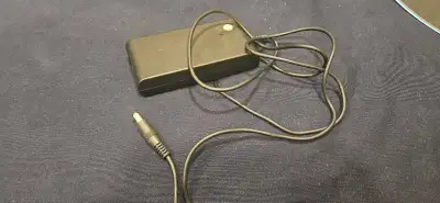 This pre-owned Toshiba laptop AC power adapter is in good working condition, perfect for replacing a...