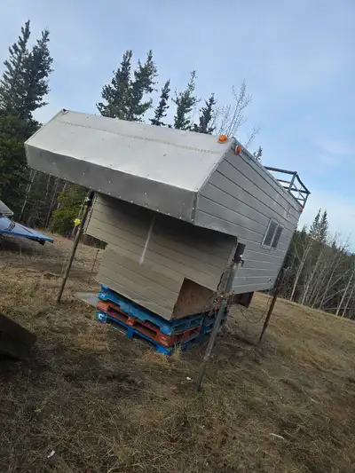Homemade camper, has cook stove and sink. Good for hunting.